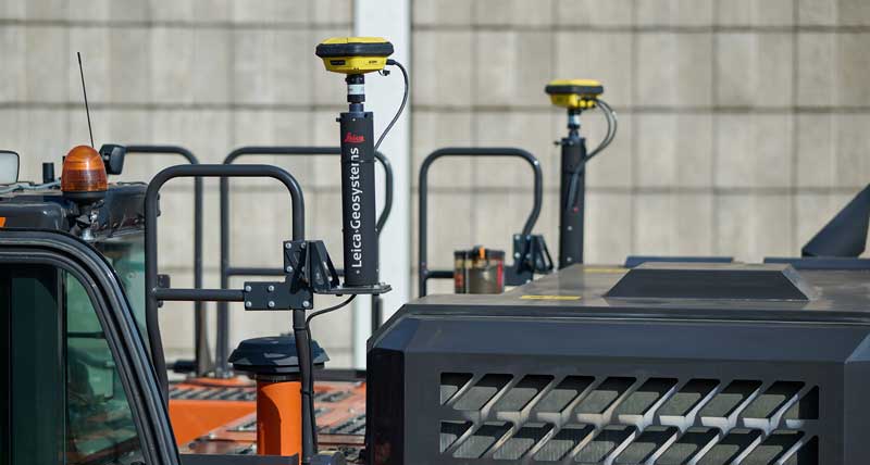 Two Leica iCON gps 120 machine Smart Antennas installed on mast on a Hitachi excavator.